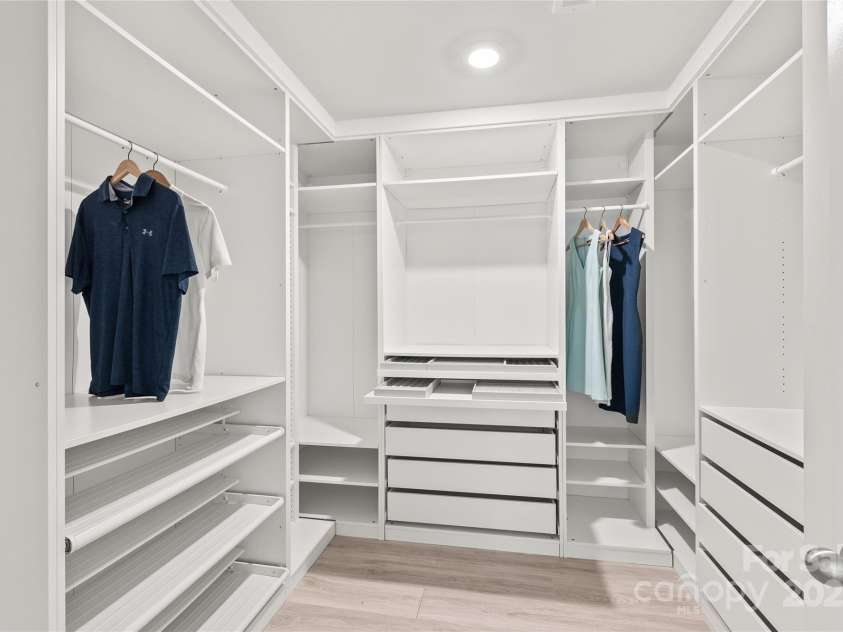 16726 Cozy Cove Road, Charlotte, NC 28278.  MLS# CAR4288880, YatesRealty ID 30958. A beautifully crafted walk-in closet designed to keep your wardrobe perfectly organized.