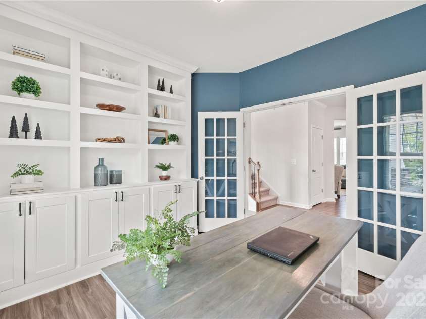 16726 Cozy Cove Road, Charlotte, NC 28278.  MLS# CAR4288880, YatesRealty ID 30958. A flex room that blends beauty and practicality—with glass French doors for style and built-ins for smart storage.