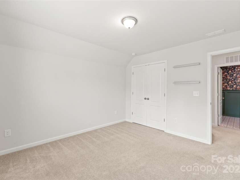 16726 Cozy Cove Road, Charlotte, NC 28278.  MLS# CAR4288880, YatesRealty ID 30958. Bedroom 2 is a flexible space with plenty of natural light and room to grow.