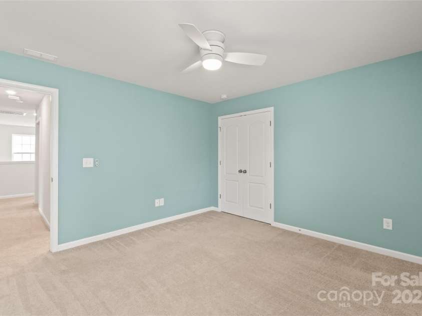 16726 Cozy Cove Road, Charlotte, NC 28278.  MLS# CAR4288880, YatesRealty ID 30958. Bedroom 3 provides a peaceful retreat with plenty of natural light and space.