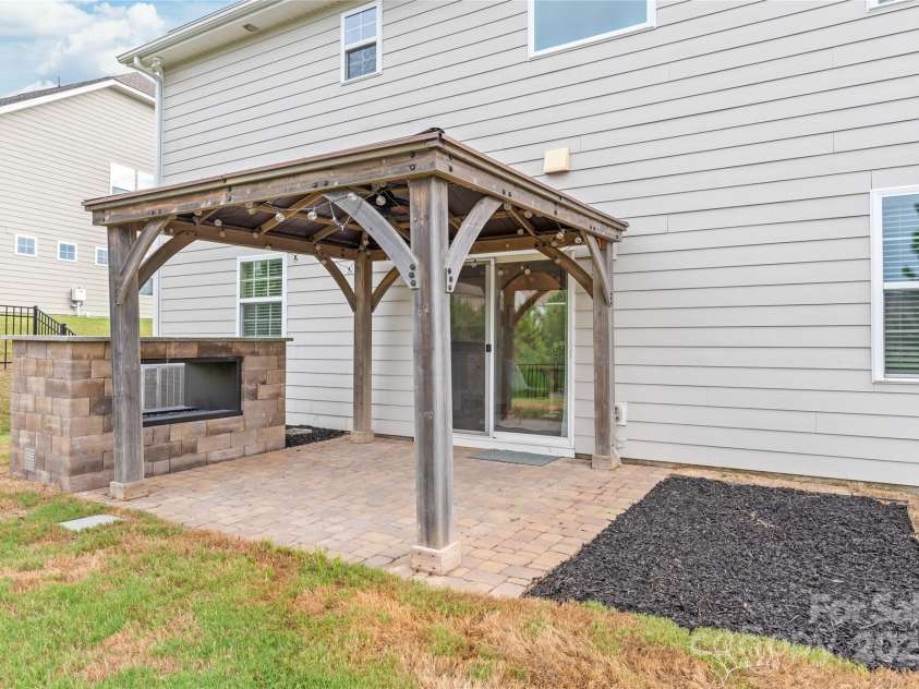 16726 Cozy Cove Road, Charlotte, NC 28278.  MLS# CAR4288880, YatesRealty ID 30958. Enjoy the warmth and ambiance of the built-in fireplace in your private gazebo retreat.
