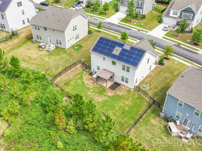 16726 Cozy Cove Road, Charlotte, NC 28278.  MLS# CAR4288880, YatesRealty ID 30958. Go green with solar panels that power your home and reduce your carbon footprint.