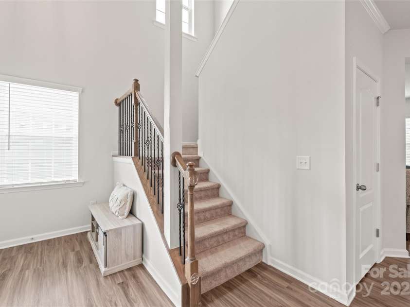 16726 Cozy Cove Road, Charlotte, NC 28278.  MLS# CAR4288880, YatesRealty ID 30958. Iron spindles add a timeless touch as you head upstairs to three bedrooms designed for comfort.