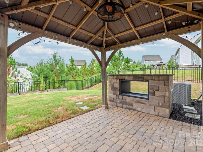 16726 Cozy Cove Road, Charlotte, NC 28278.  MLS# CAR4288880, YatesRealty ID 30958. Overlooking the fenced backyard, the gazebo is the perfect spot to relax while kids or pets play freely.