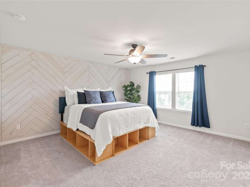 16726 Cozy Cove Road, Charlotte, NC 28278.  MLS# CAR4288880, YatesRealty ID 30958. Wake up to peaceful backyard views right from your primary bedroom—a true private retreat.