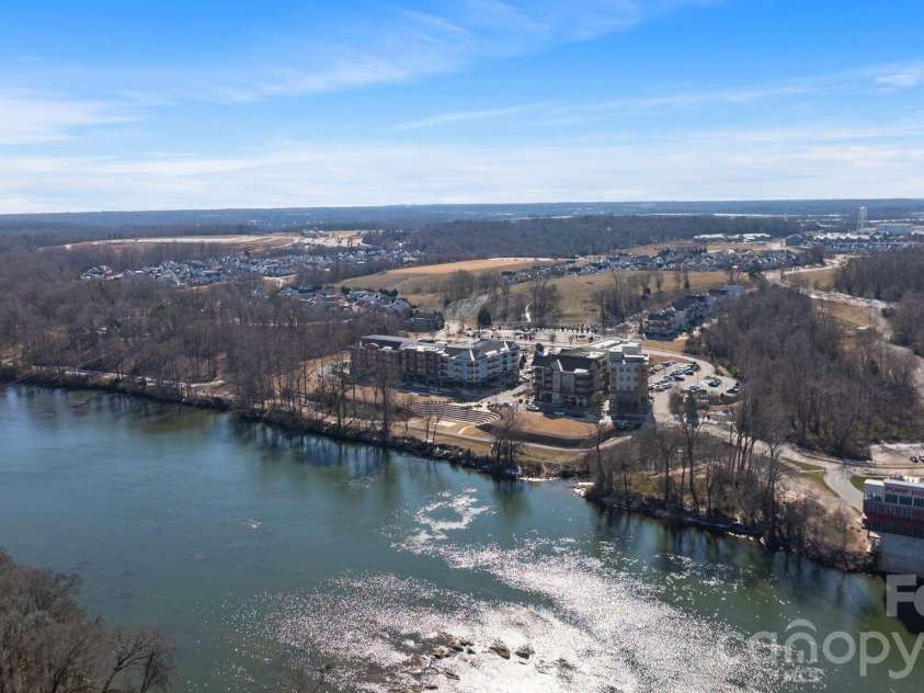 684 Dunkins Ferry Road, Rock Hill, SC 29730.  MLS# CAR4341419, YatesRealty ID 3096. Riverwalk, kayak launch, scenic river trails, playgrounds, sports fields, fitness center, grocery store, and waterfront dining!