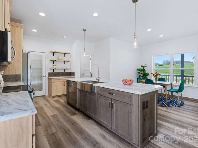 139 Mullinax Drive, Hendersonville, NC 28792.  MLS# CAR4242141, YatesRealty ID 30962. Thoughtfully designed with comfort and style in mind, this home offers a bright, airy open floor plan that’s ideal for both everyday living and entertaining.