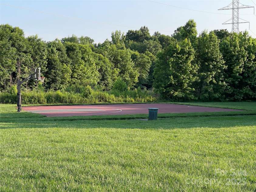 707 Five Leaf Lane, Waxhaw, NC 28173.  MLS# CAR4266012, YatesRealty ID 30963. Basket Ball court