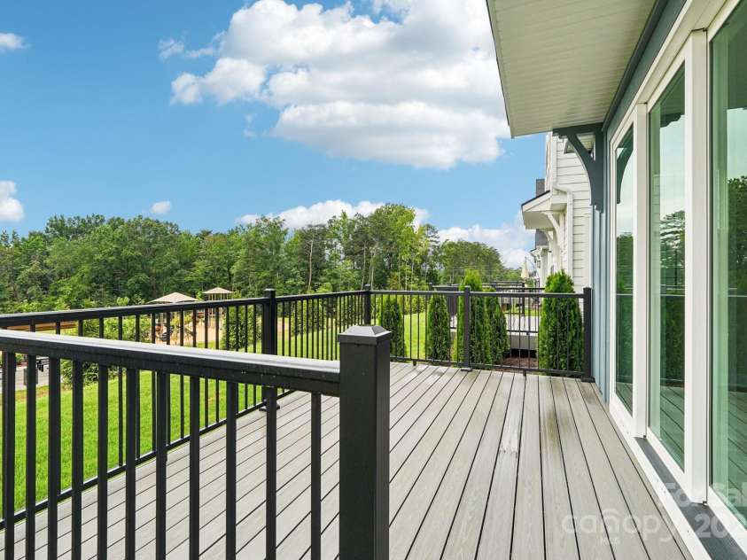 921 Coast Drive, Tega Cay, SC 29708.  MLS# CAR4289749, YatesRealty ID 30964. Deck at rear