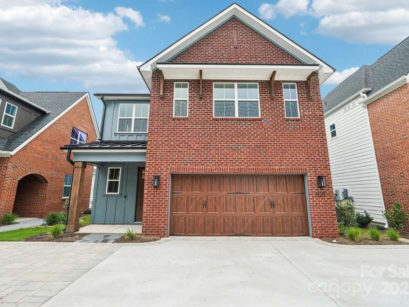 921 Coast Drive, Tega Cay, SC 29708.  MLS# CAR4289749, YatesRealty ID 30964. Exterior of Home
