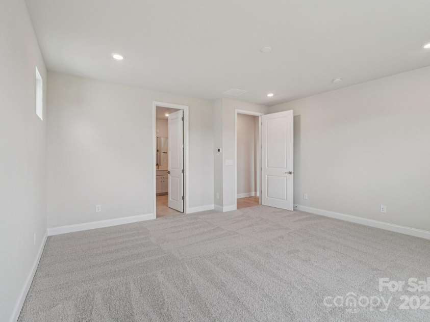 921 Coast Drive, Tega Cay, SC 29708.  MLS# CAR4289749, YatesRealty ID 30964. Primary bedroom