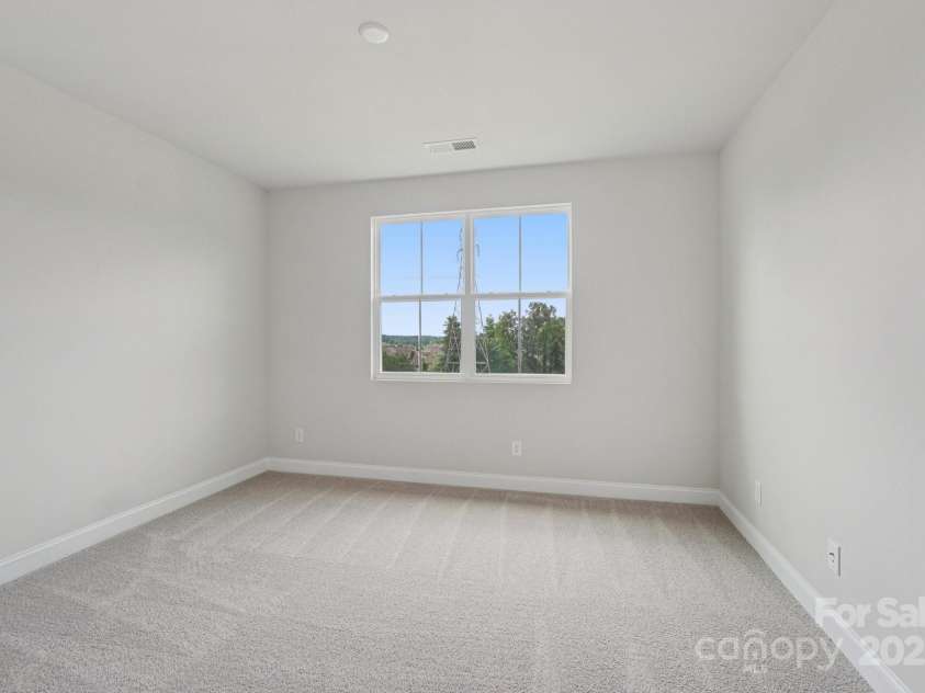 921 Coast Drive, Tega Cay, SC 29708.  MLS# CAR4289749, YatesRealty ID 30964. Secondary bedroom