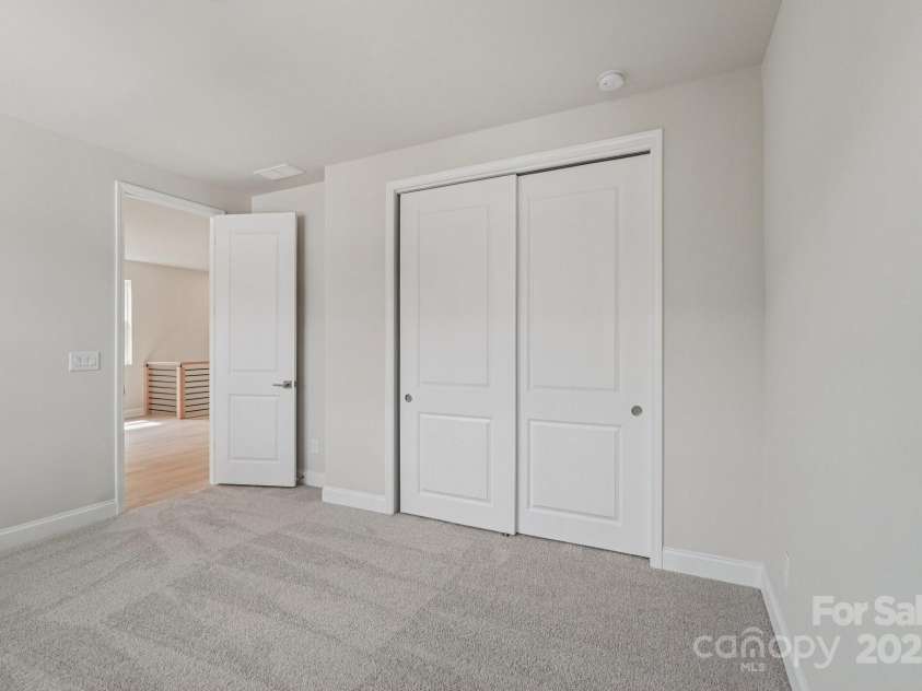 921 Coast Drive, Tega Cay, SC 29708.  MLS# CAR4289749, YatesRealty ID 30964. Secondary bedroom
