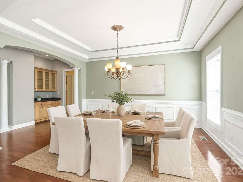 203 Vanderbilt Boulevard, Locust, NC 28097.  MLS# CAR4289783, YatesRealty ID 30966. Virtually Staged Representation