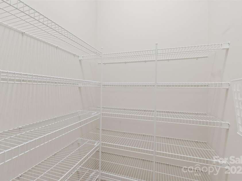 203 Vanderbilt Boulevard, Locust, NC 28097.  MLS# CAR4289783, YatesRealty ID 30966. Walk-in Pantry