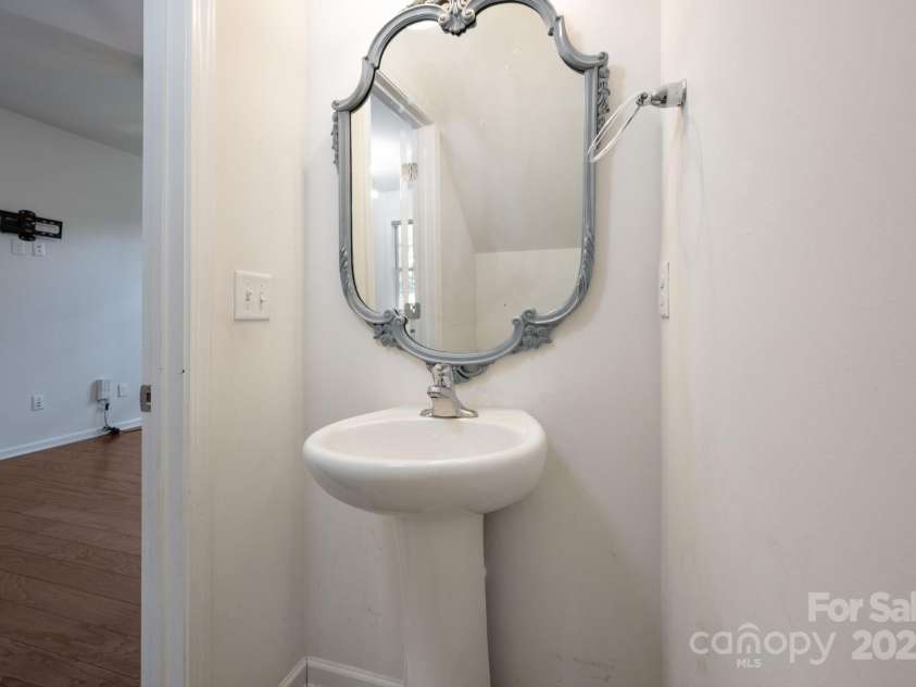 8 Ringed Teal Court, Arden, NC 28704.  MLS# CAR4289804, YatesRealty ID 30967. Guest half bath off living room
