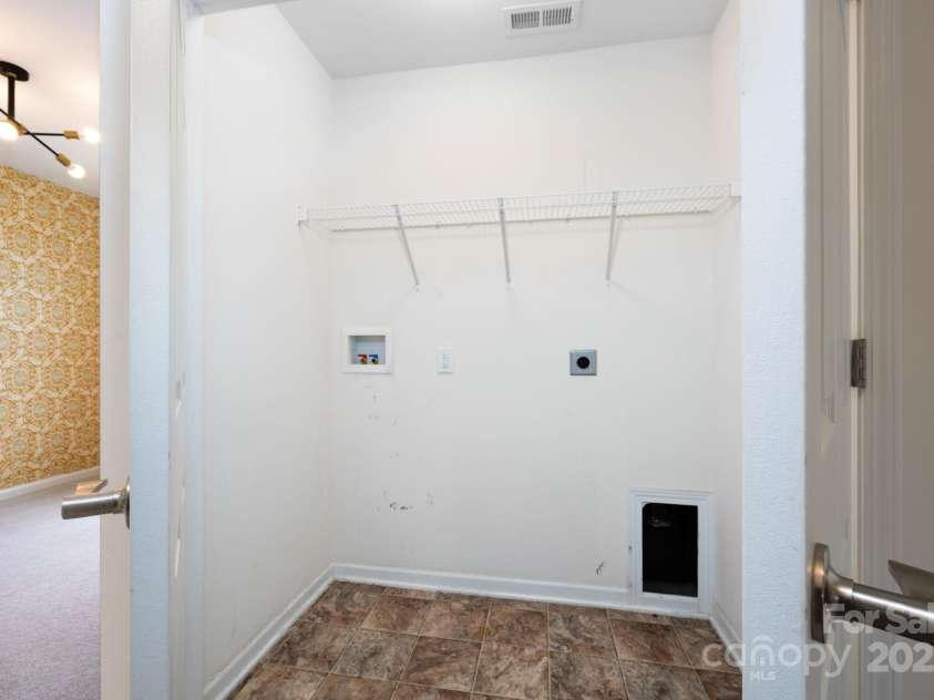 8 Ringed Teal Court, Arden, NC 28704.  MLS# CAR4289804, YatesRealty ID 30967. Laundry top of stairs
