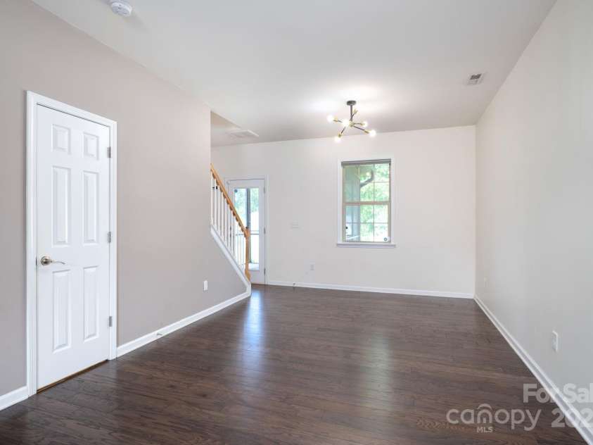 8 Ringed Teal Court, Arden, NC 28704.  MLS# CAR4289804, YatesRealty ID 30967. Living room to dinning guest bath on left