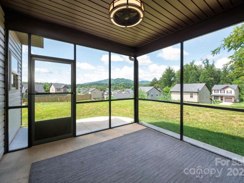 8 Ringed Teal Court, Arden, NC 28704.  MLS# CAR4289804, YatesRealty ID 30967. Mountain views. Perfect corner of lawn for firepit