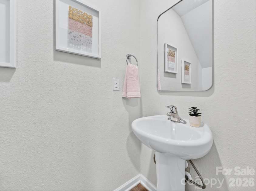 8128 Derby Woods Lane, Charlotte, NC 28214.  MLS# CAR4385212, YatesRealty ID 30971. Main level guest bath