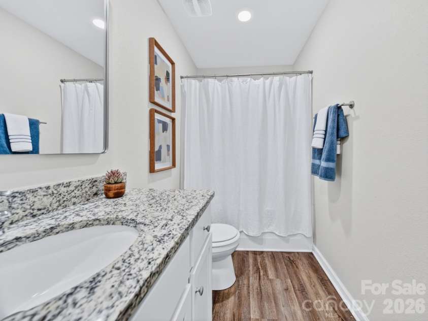 8128 Derby Woods Lane, Charlotte, NC 28214.  MLS# CAR4385212, YatesRealty ID 30971. Upstairs second bath