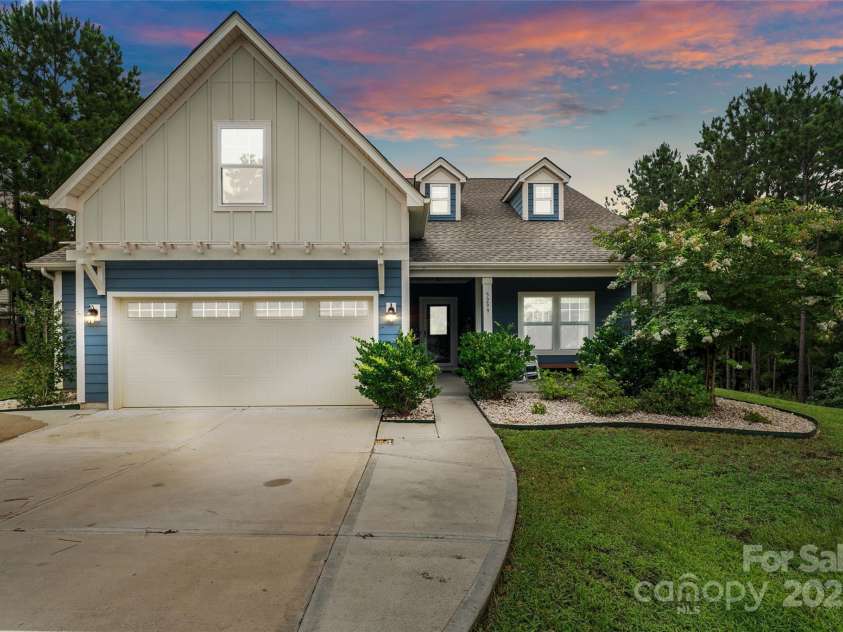 5299 Admirals Landing, Lancaster, SC 29720.  MLS# CAR4290028, YatesRealty ID 30974. Enjoy lake views from the front porch as the sun sets