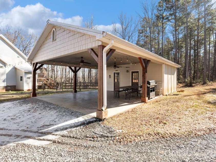 2370 Killian Road, Edgemoor, SC 29712.  MLS# CAR4341782, YatesRealty ID 3098. Carport Area w/ prep kitchen and storage area