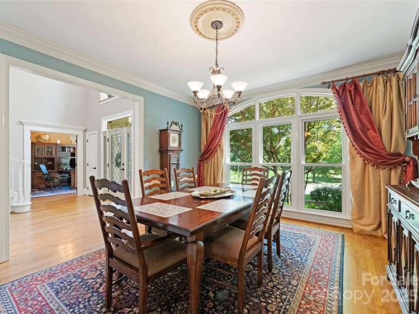 18600 River Falls Drive, Davidson, NC 28036.  MLS# CAR4231533, YatesRealty ID 30985. Dining Room with large windows. *All new windows throughout!