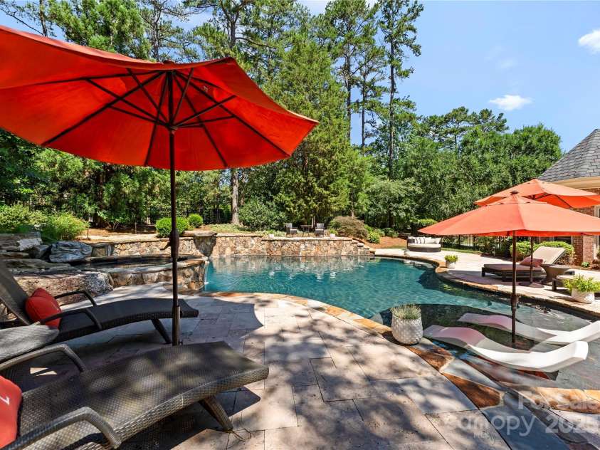 18600 River Falls Drive, Davidson, NC 28036.  MLS# CAR4231533, YatesRealty ID 30985. Pool sun ledge!