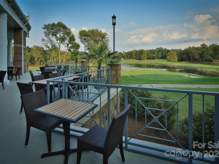 18600 River Falls Drive, Davidson, NC 28036.  MLS# CAR4231533, YatesRealty ID 30985. River Run Country Club's Outdoor Dining and Beautiful Golf Course Views .