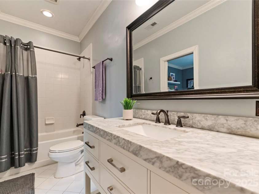 18600 River Falls Drive, Davidson, NC 28036.  MLS# CAR4231533, YatesRealty ID 30985. Upstairs shared bathroom with new vanity.