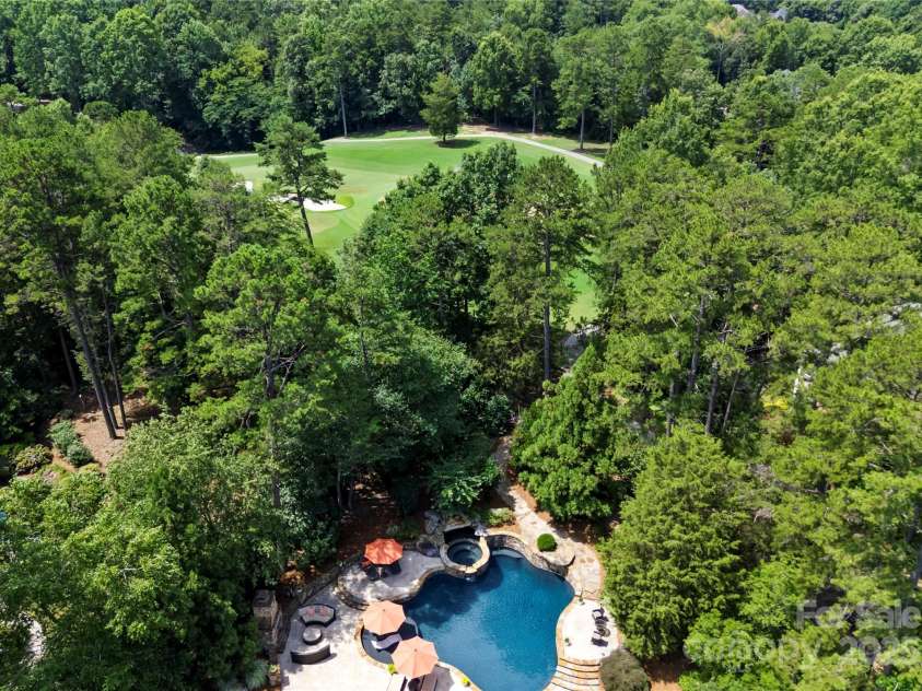 18600 River Falls Drive, Davidson, NC 28036.  MLS# CAR4231533, YatesRealty ID 30985. Your own private oasis.