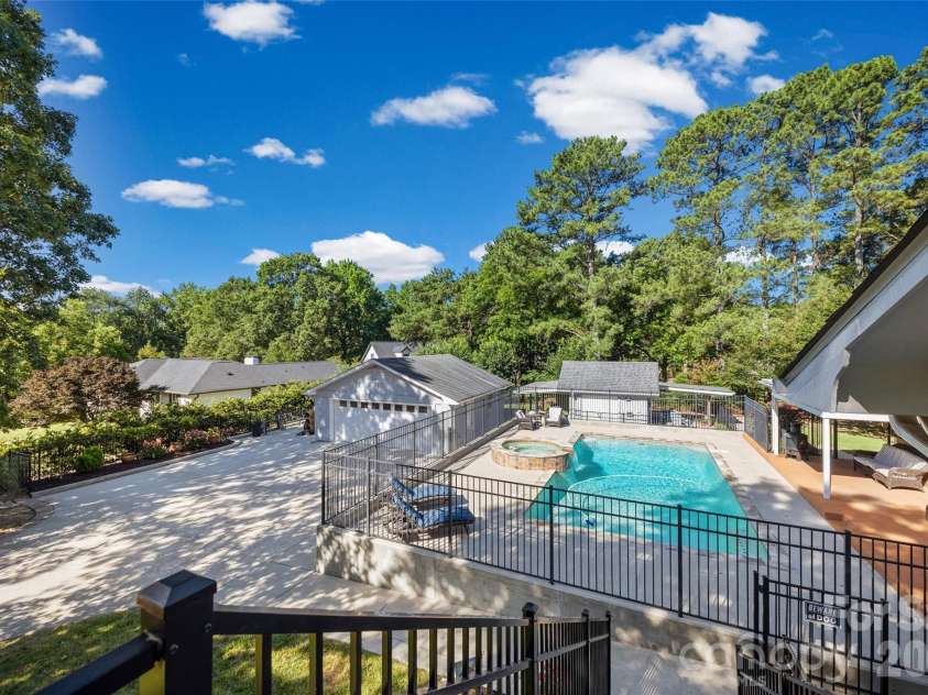 3101 Mckee Road, Charlotte, NC 28270.  MLS# CAR4389942, YatesRealty ID 30986. 2nd driveway leading to oversized 2 car garage