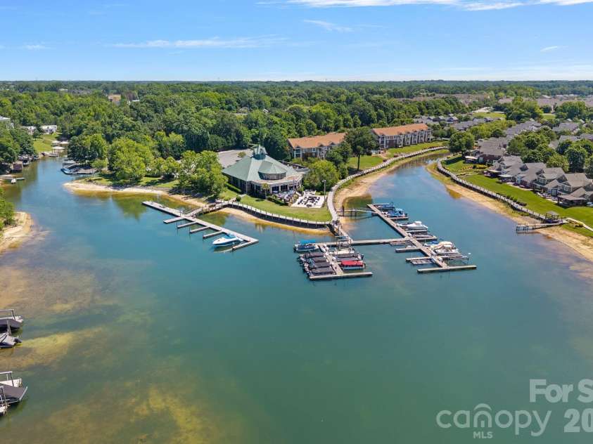 18609 Harborside Drive, Cornelius, NC 28031.  MLS# CAR4383156, YatesRealty ID 30987. Get your steps in - dining, boating, and home, all within walking distance!