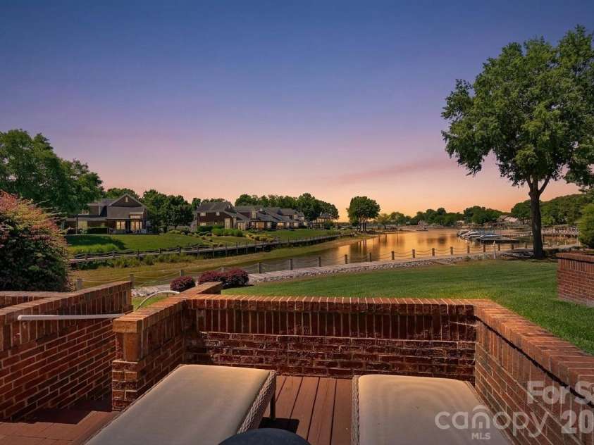 18609 Harborside Drive, Cornelius, NC 28031.  MLS# CAR4383156, YatesRealty ID 30987. Golden Hour at 18609 Harborside Dr.!