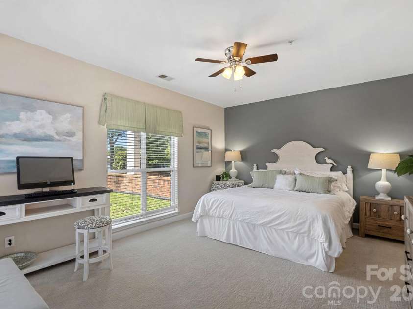 18609 Harborside Drive, Cornelius, NC 28031.  MLS# CAR4383156, YatesRealty ID 30987. Spacious primary suite, also with Lake Norman views!