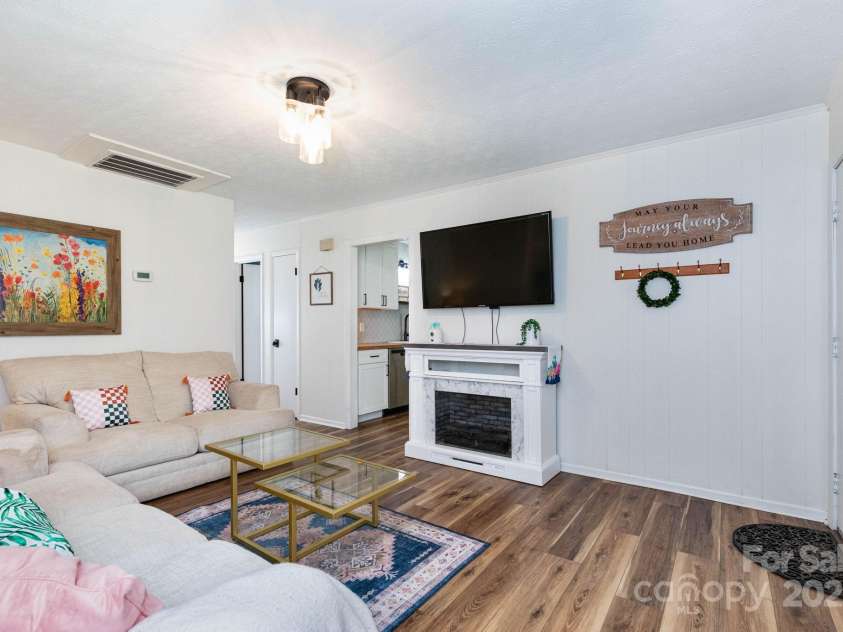 94 Fairhaven Street, Clyde, NC 28721.  MLS# CAR4279982, YatesRealty ID 30987. Living Room