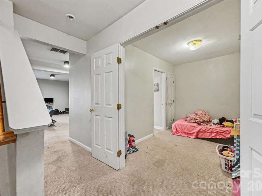 10946 Garden Oaks Lane, Charlotte, NC 28273.  MLS# CAR4389129, YatesRealty ID 30988. Lower Level Third Bedroom with Shared Full Bathroom