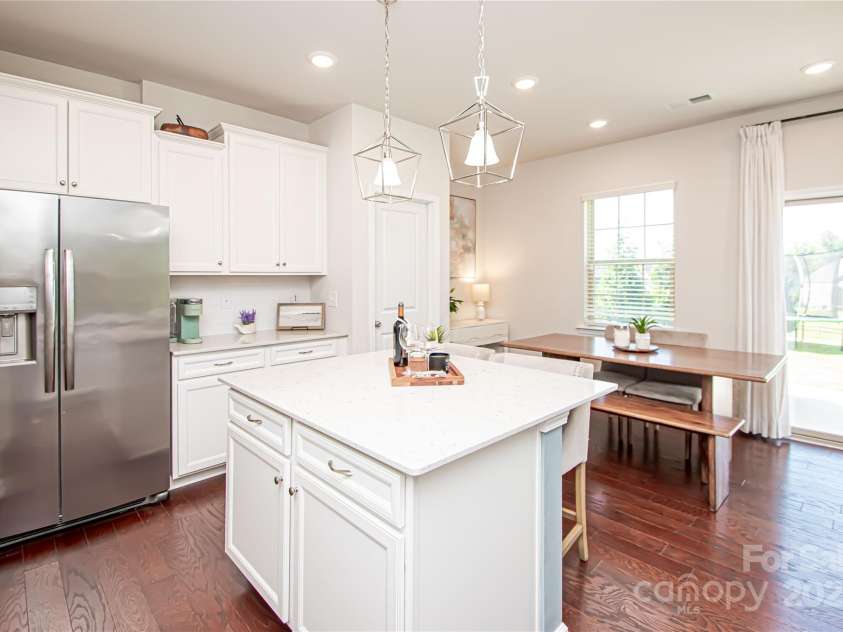 17637 Snug Harbor Road, Charlotte, NC 28278.  MLS# CAR4283392, YatesRealty ID 30990. Sliding glass door leads to an expansive, fenced backyard—perfect for outdoor living and entertaining.