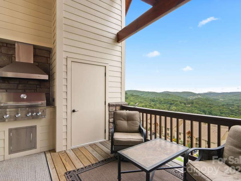 552 Penny Lane, Banner Elk, NC 28604.  MLS# CAR4290403, YatesRealty ID 30997. Dining outside with a view