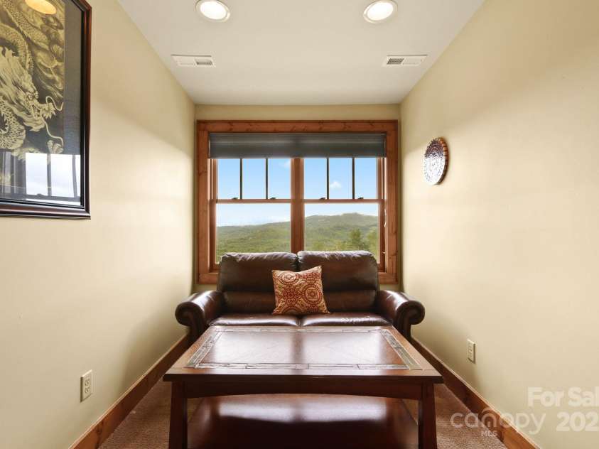 552 Penny Lane, Banner Elk, NC 28604.  MLS# CAR4290403, YatesRealty ID 30997. Guest bedroom sitting area/reading nook