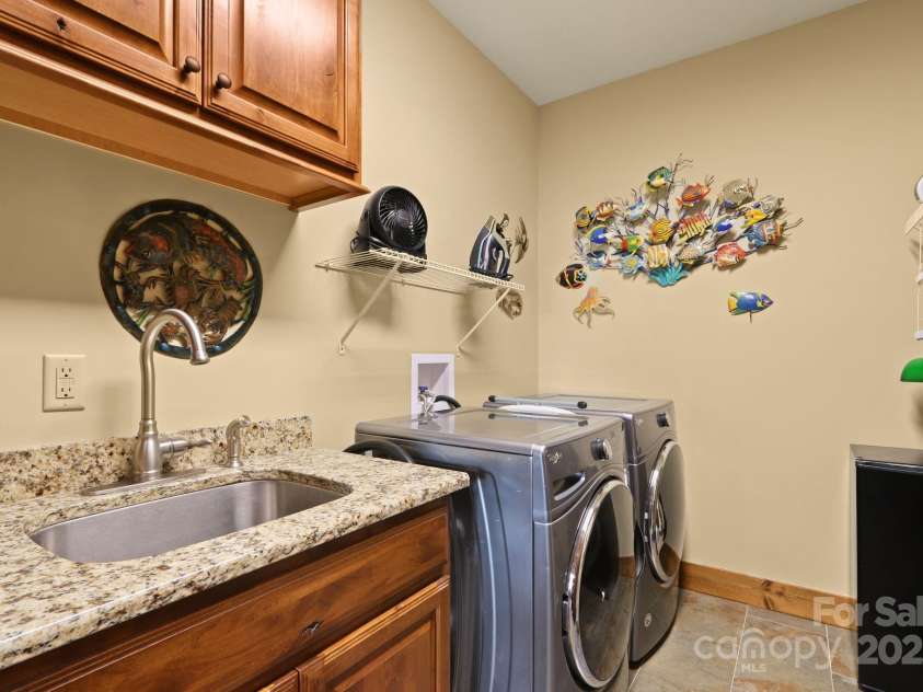 552 Penny Lane, Banner Elk, NC 28604.  MLS# CAR4290403, YatesRealty ID 30997. Laundry room