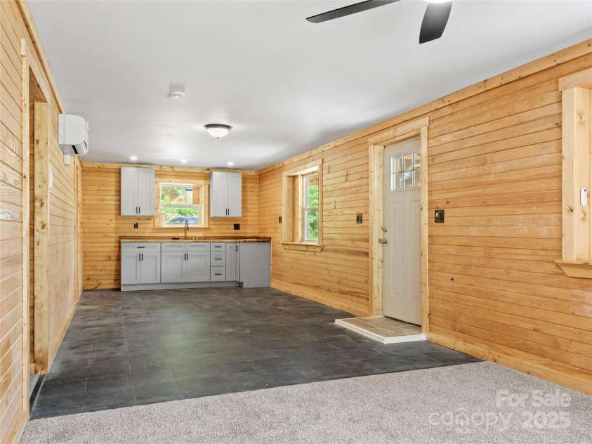 137 Red Maple Lane, Burnsville, NC 28714.  MLS# CAR4239902, YatesRealty ID 3100. Lower Floor Kitchen Area