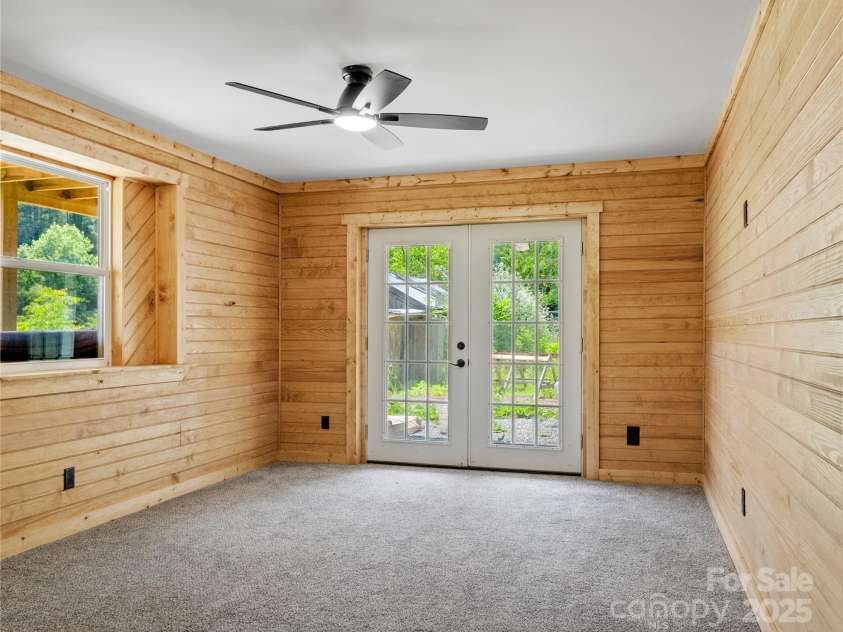 137 Red Maple Lane, Burnsville, NC 28714.  MLS# CAR4239902, YatesRealty ID 3100. Lower Floor Living Room