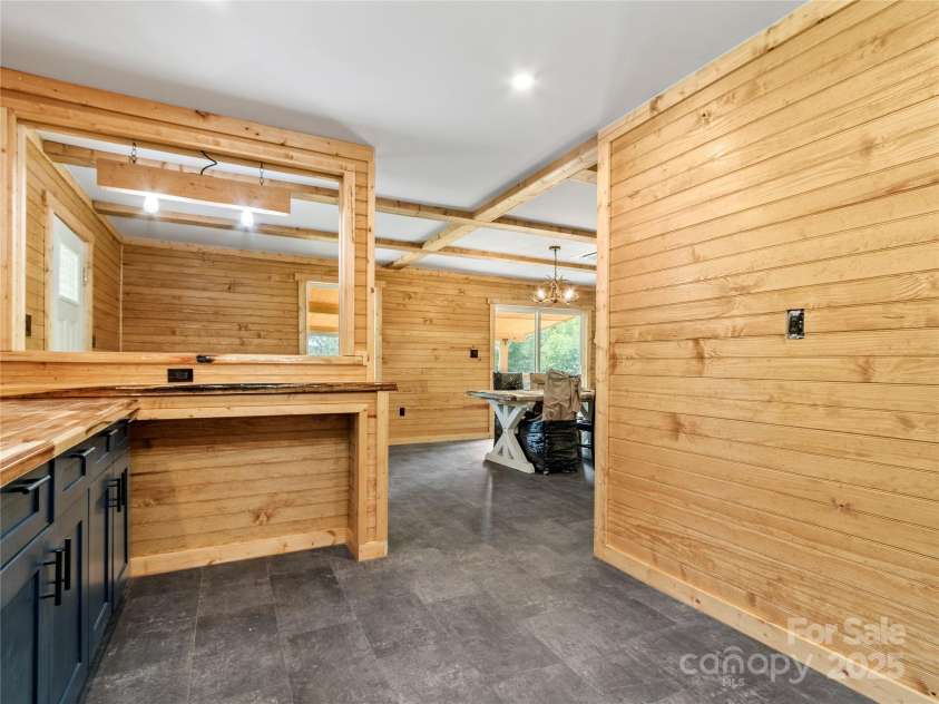 137 Red Maple Lane, Burnsville, NC 28714.  MLS# CAR4239902, YatesRealty ID 3100. Upper Level Kitchen and Bar Area