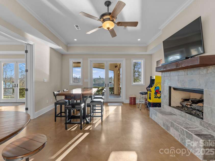 296 Windemere Isle Road, Statesville, NC 28677.  MLS# CAR4219833, YatesRealty ID 31003. Family/Media room in basement w/fireplace