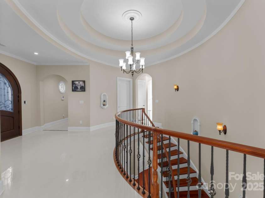 296 Windemere Isle Road, Statesville, NC 28677.  MLS# CAR4219833, YatesRealty ID 31003. Grand foyer entrance w/marble floors & Brazilian Cherry staircase
