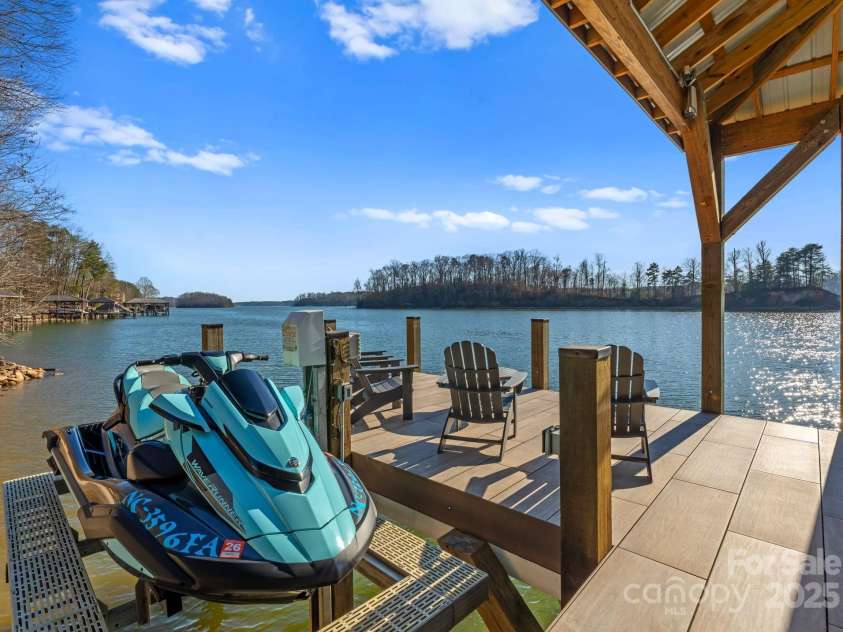 296 Windemere Isle Road, Statesville, NC 28677.  MLS# CAR4219833, YatesRealty ID 31003. Jet ski lift & sunny seating area. Dock has ice maker, pressure washer & sound system