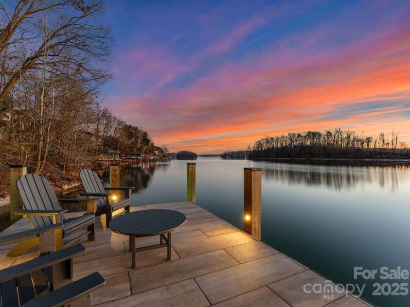 296 Windemere Isle Road, Statesville, NC 28677.  MLS# CAR4219833, YatesRealty ID 31003. Twilight shot of the dock and Lake Norman sunset