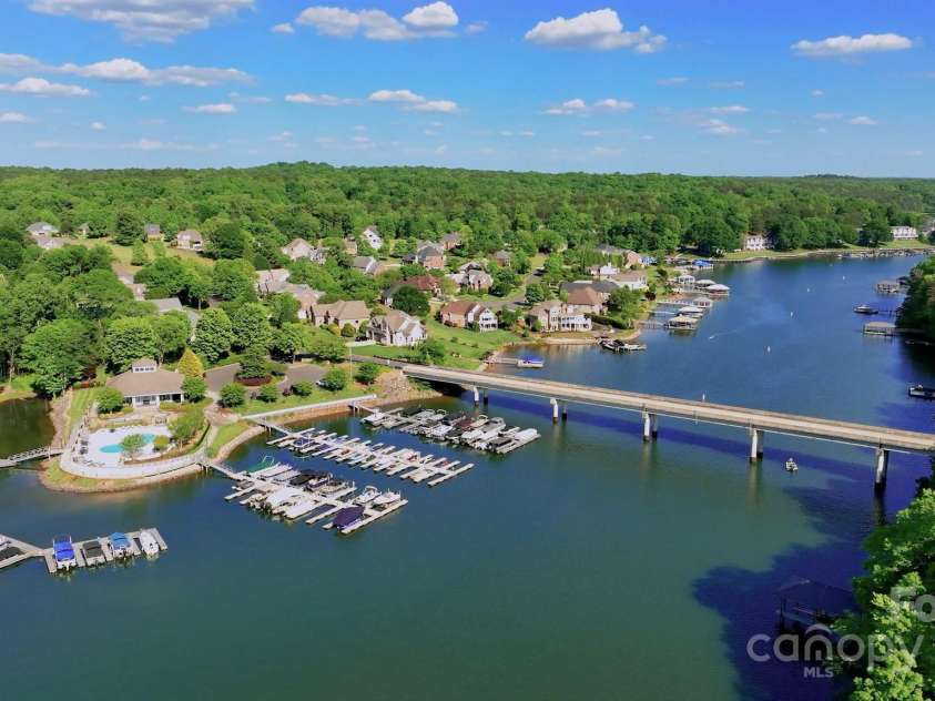 296 Windemere Isle Road, Statesville, NC 28677.  MLS# CAR4219833, YatesRealty ID 31003. Windemere Island bridge and Windemere Community Clubhouse, pool and docks